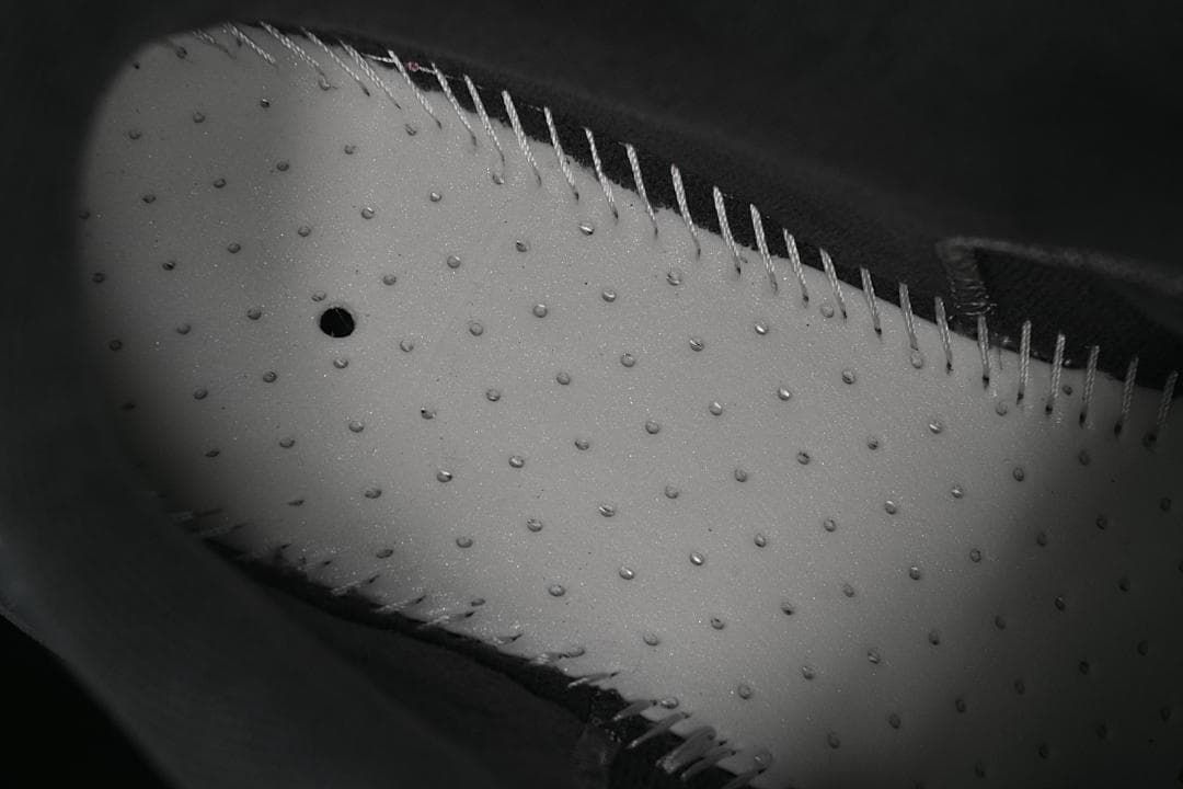 Close-up of textured outsole and stitching