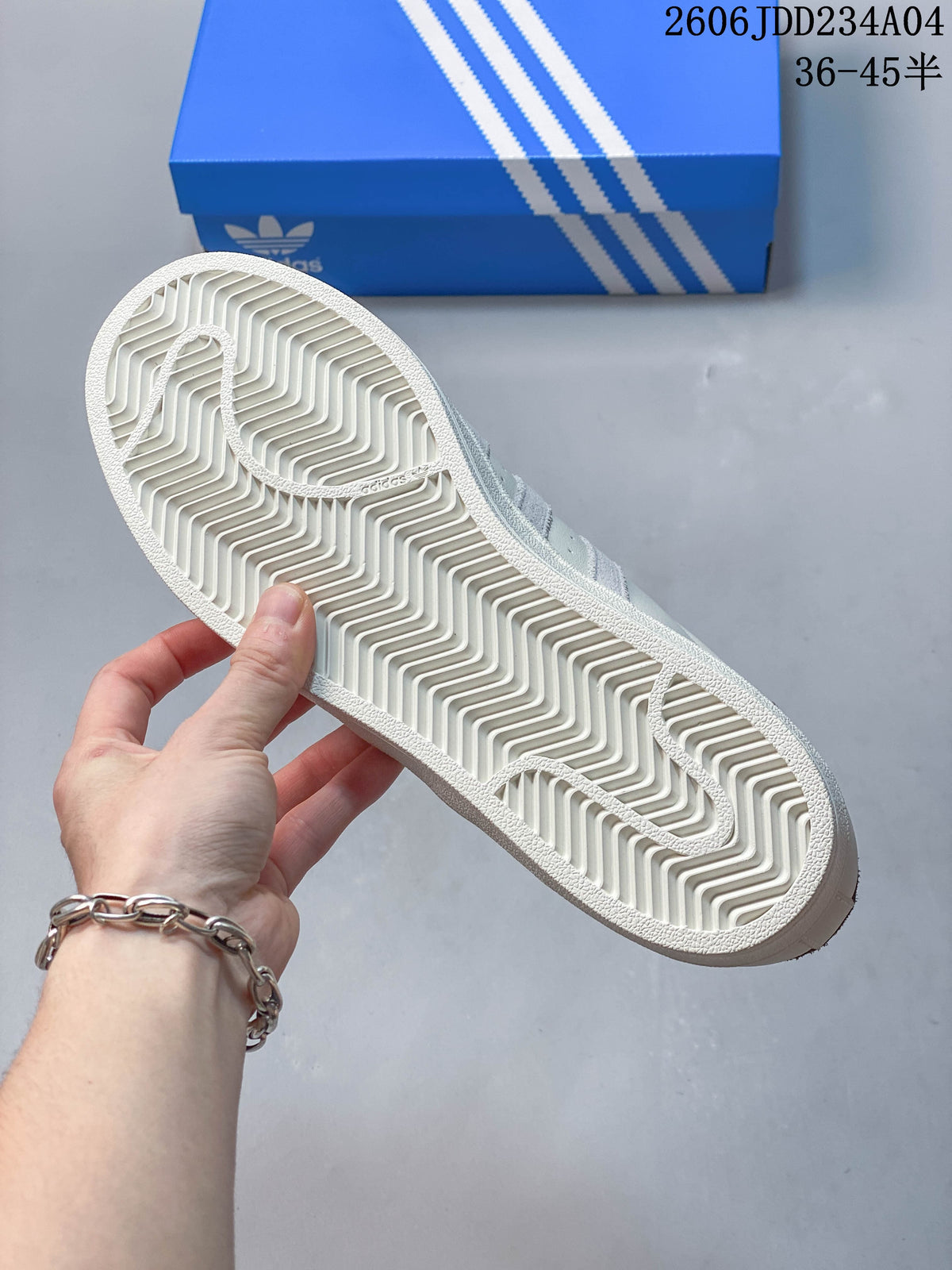 Underside of an Adidas Superstar sneaker showing the tread pattern.