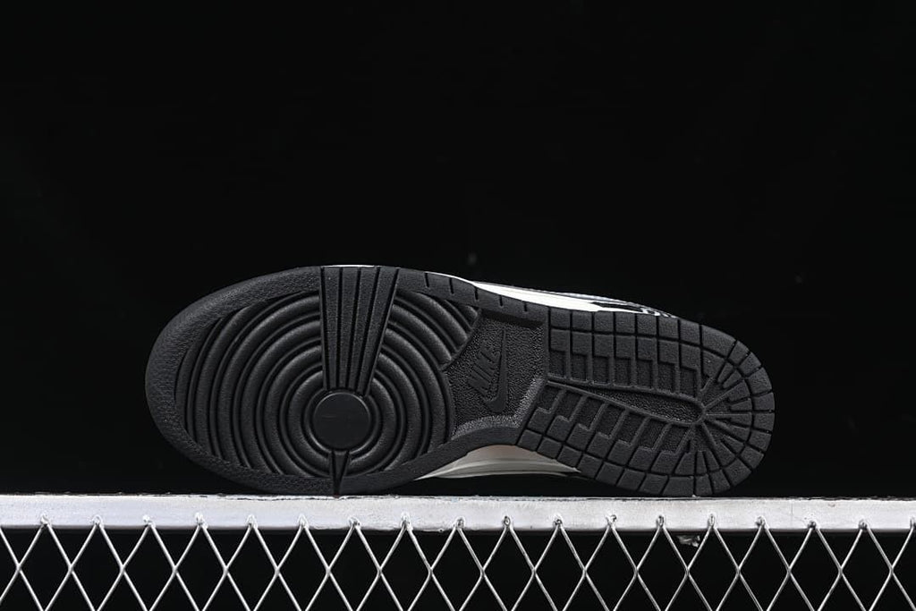 Underside view showing the black outsole tread pattern.