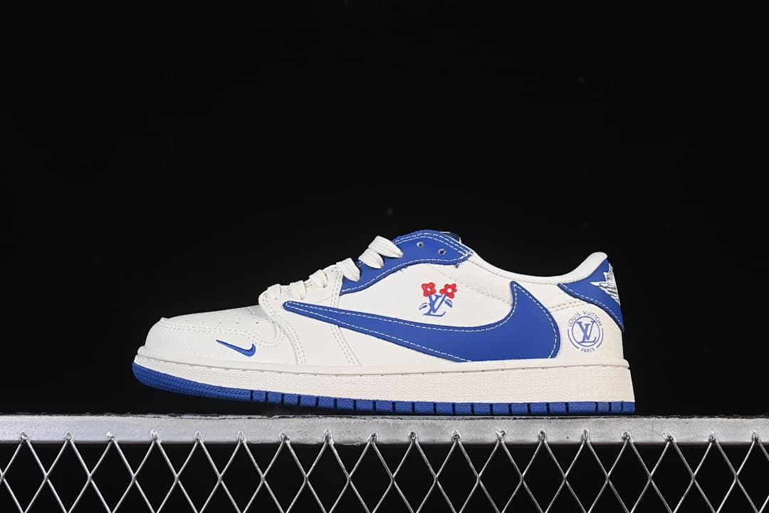 Side view of a white and blue low-top sneaker with floral-style graphics
