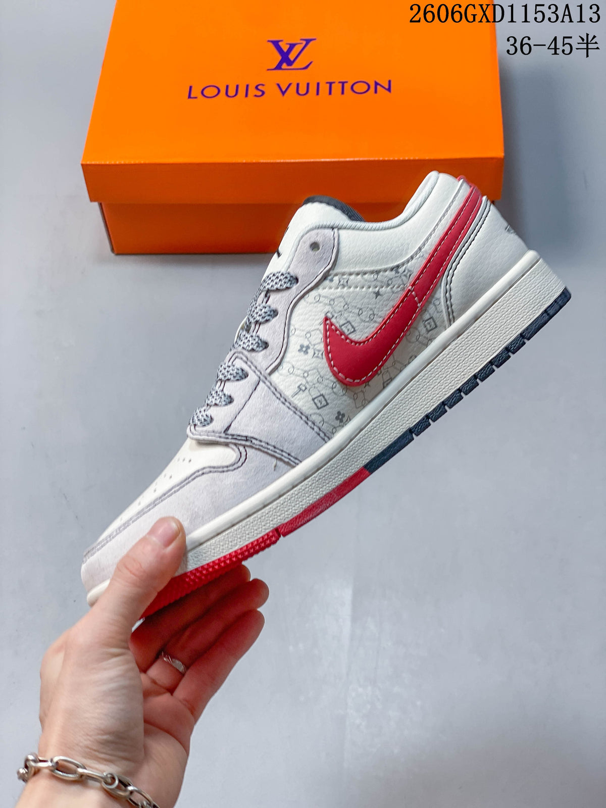 Side view showing the red side accent, patterned upper, and low-top profile