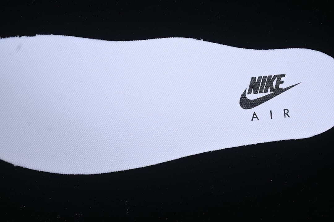 Close-up of a white insole with Nike Air branding.