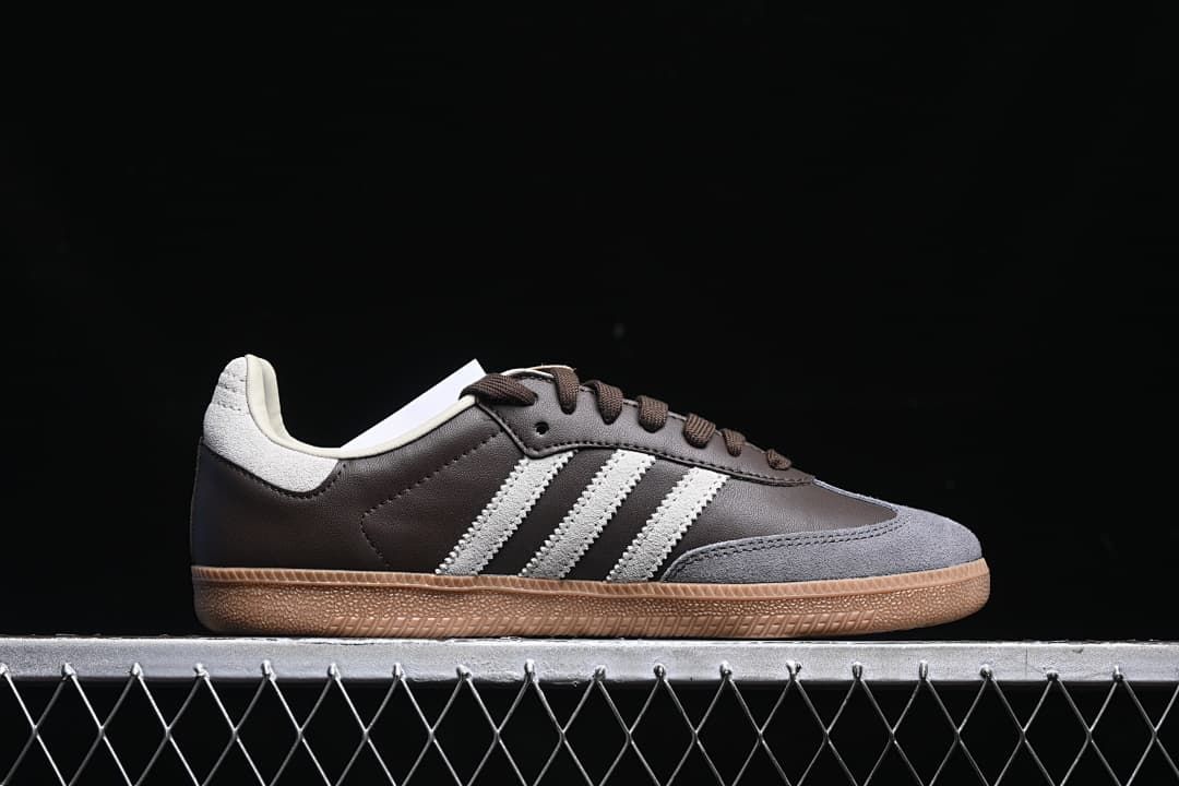 Side profile of the brown and grey Samba OG with off-white stripes