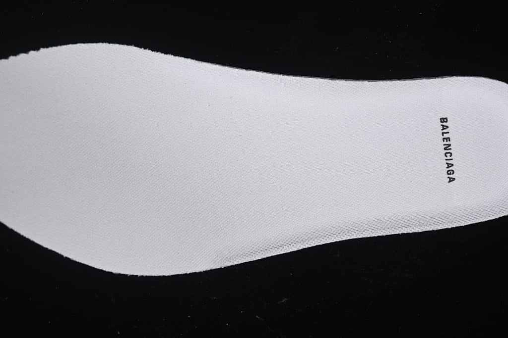 Close-up of the white insole with Balenciaga branding.