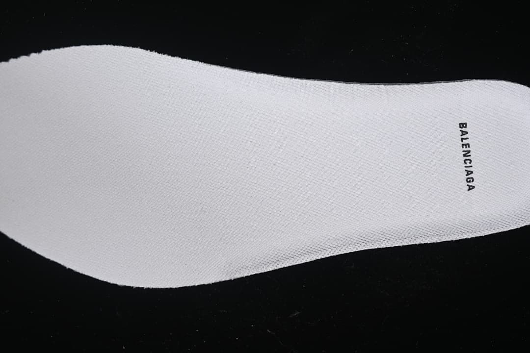 Close-up of the white insole with Balenciaga branding.