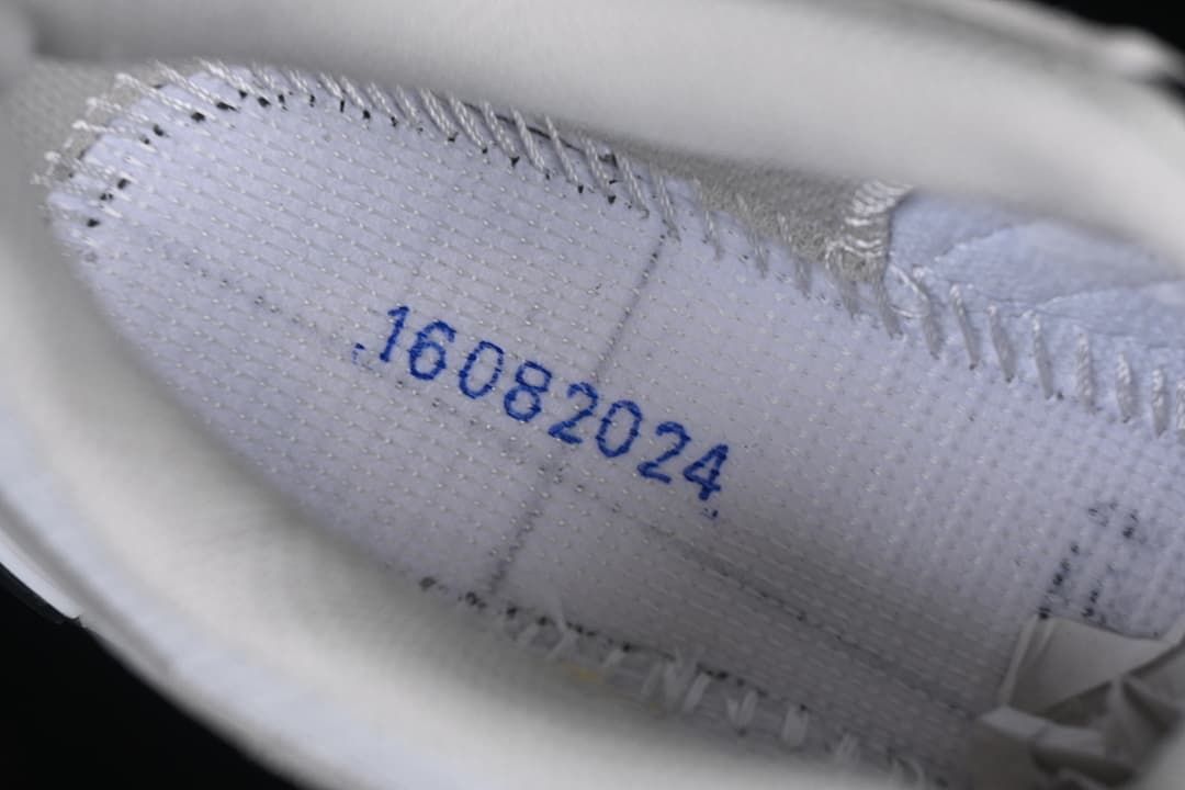 Close-up of stitching and a printed interior marking