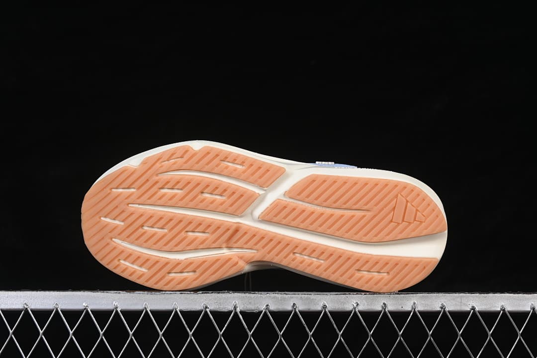 Gum-colored outsole with segmented tread pattern