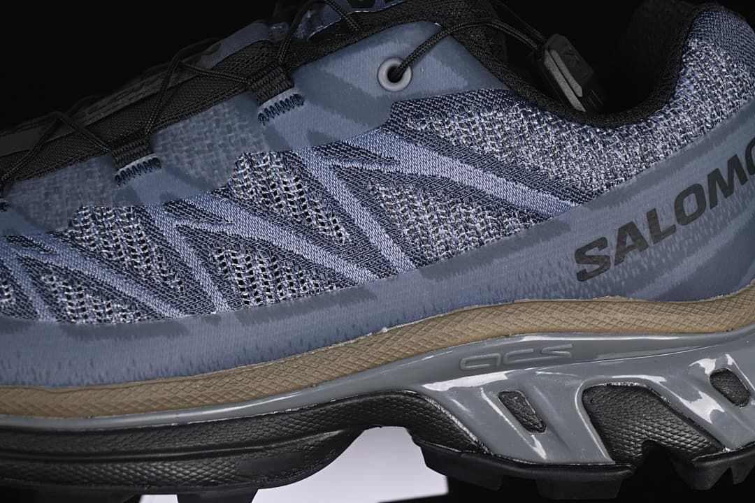 Close-up of the patterned side upper and sculpted midsole