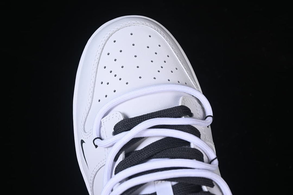 Top detail of the perforated toe and laces