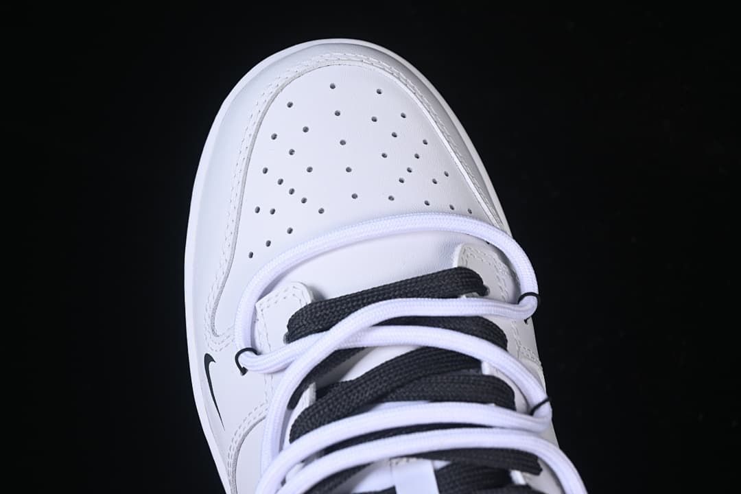 Top detail of the perforated toe and laces