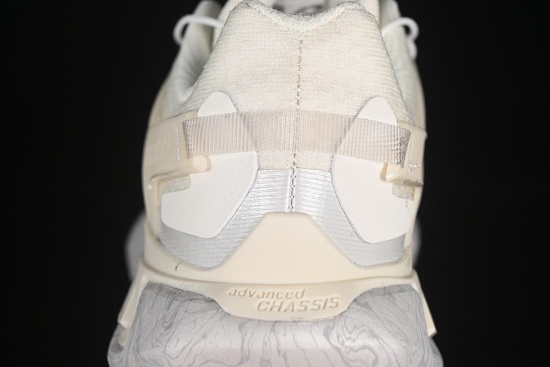 Rear view highlighting the heel structure and patterned midsole.