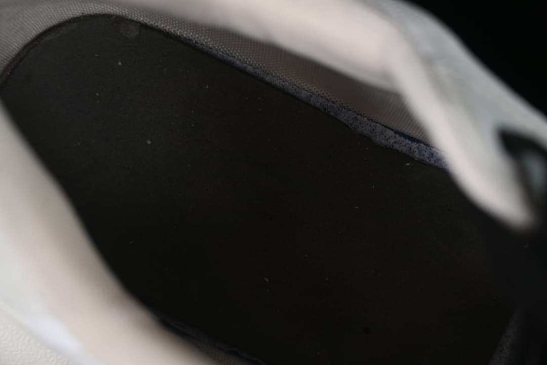 Close-up of the sneaker's dark interior lining