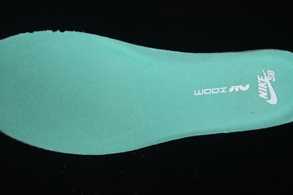 Close-up of the teal-colored insole with Nike SB branding