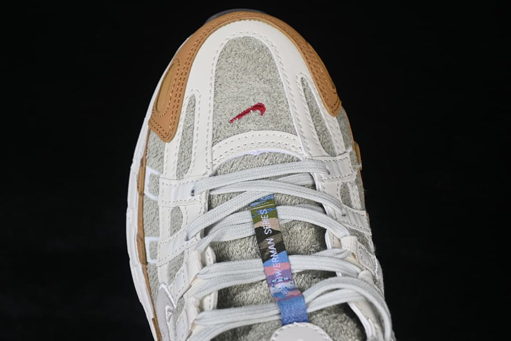 Top-down close-up of the sneaker toe and lace area