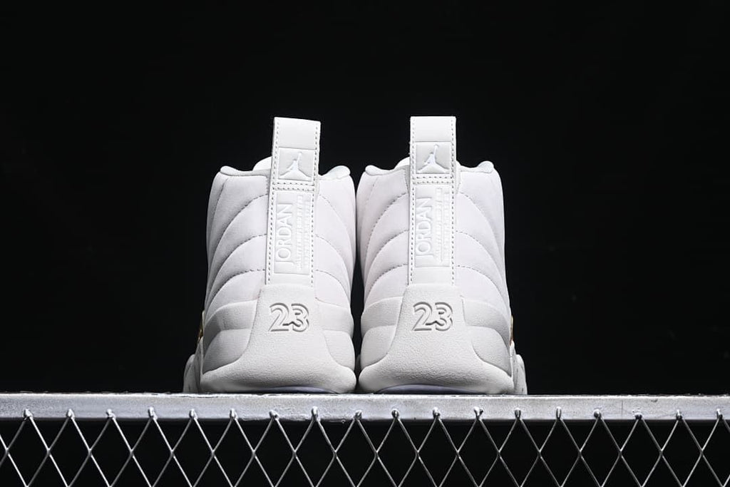 Rear view of both shoes showing the heel tabs and 23 details