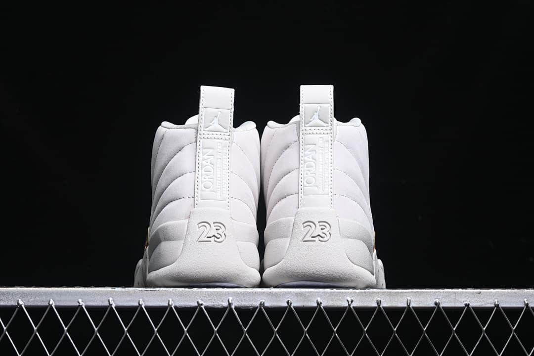 Rear view of both shoes showing the heel tabs and 23 details