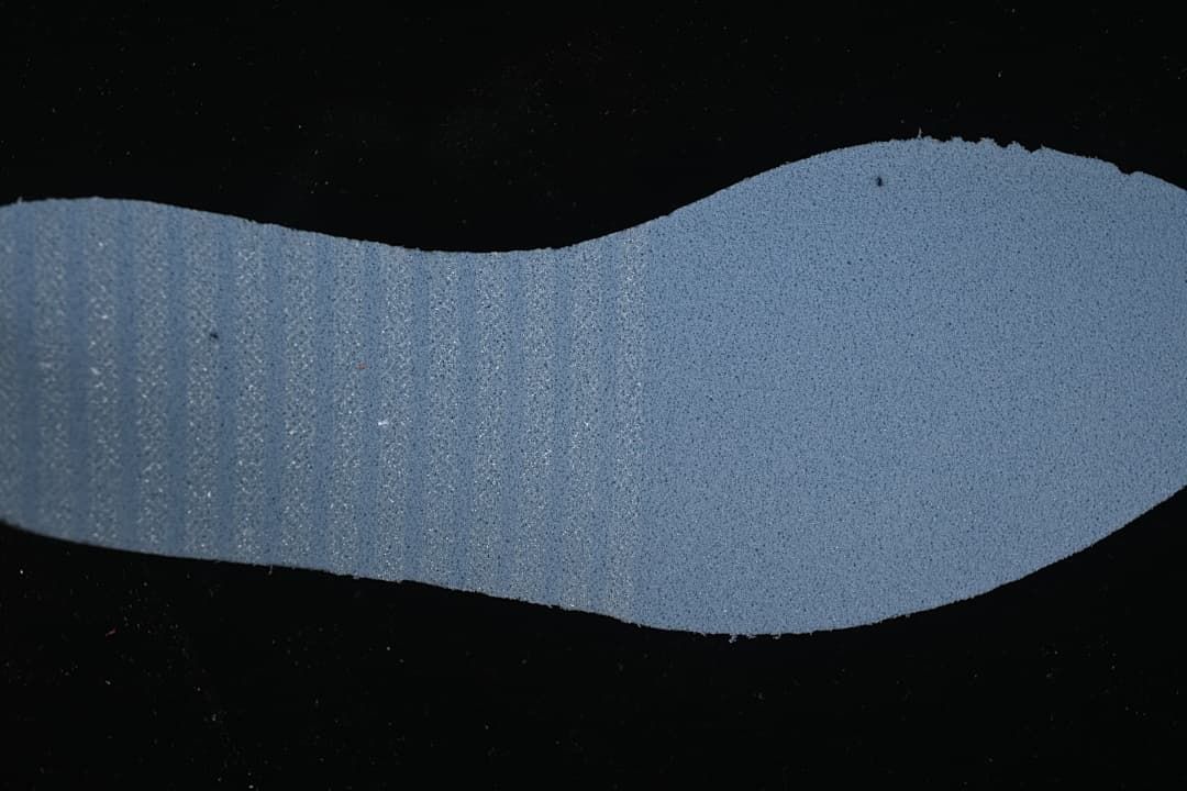Close-up of the sneaker outsole showing its textured surface.