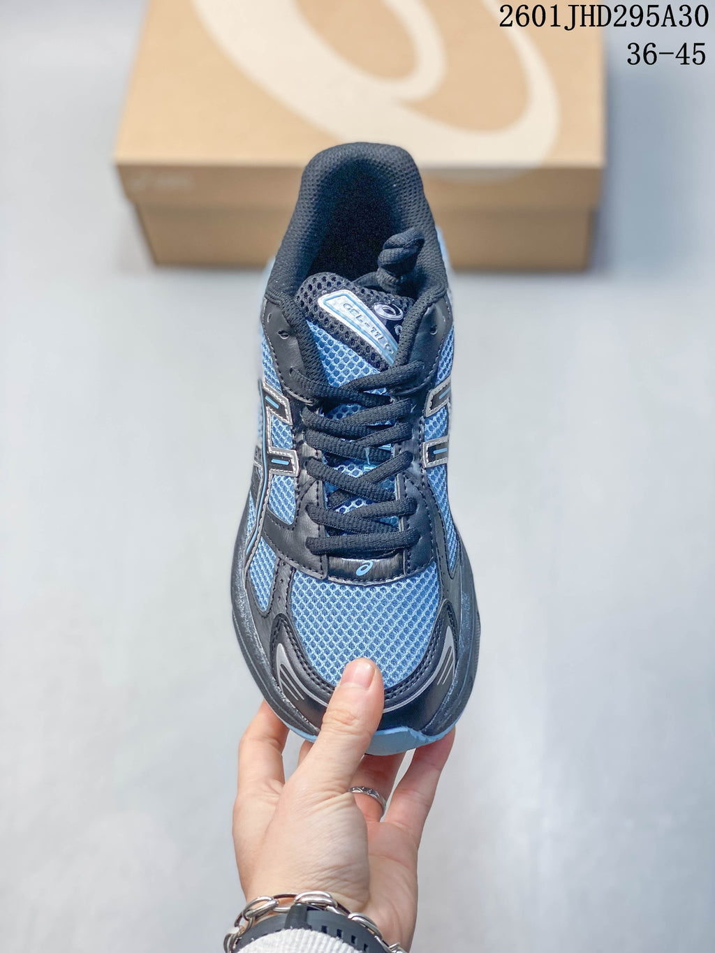 Front view highlighting the mesh toe and lace-up closure