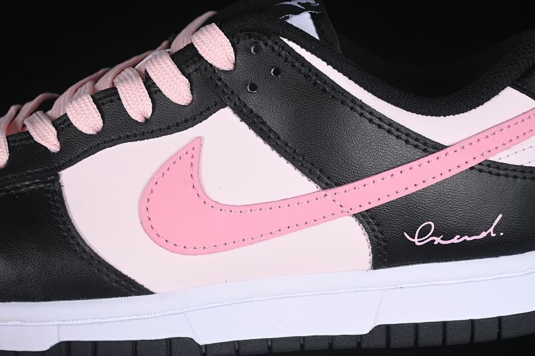 Close-up of the pink side Swoosh and black and pale pink upper