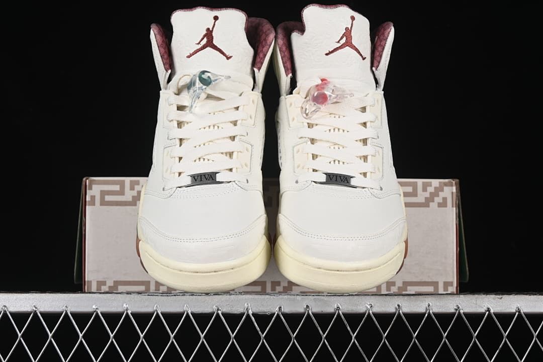 Front view of the pair with burgundy patterned tongue lining