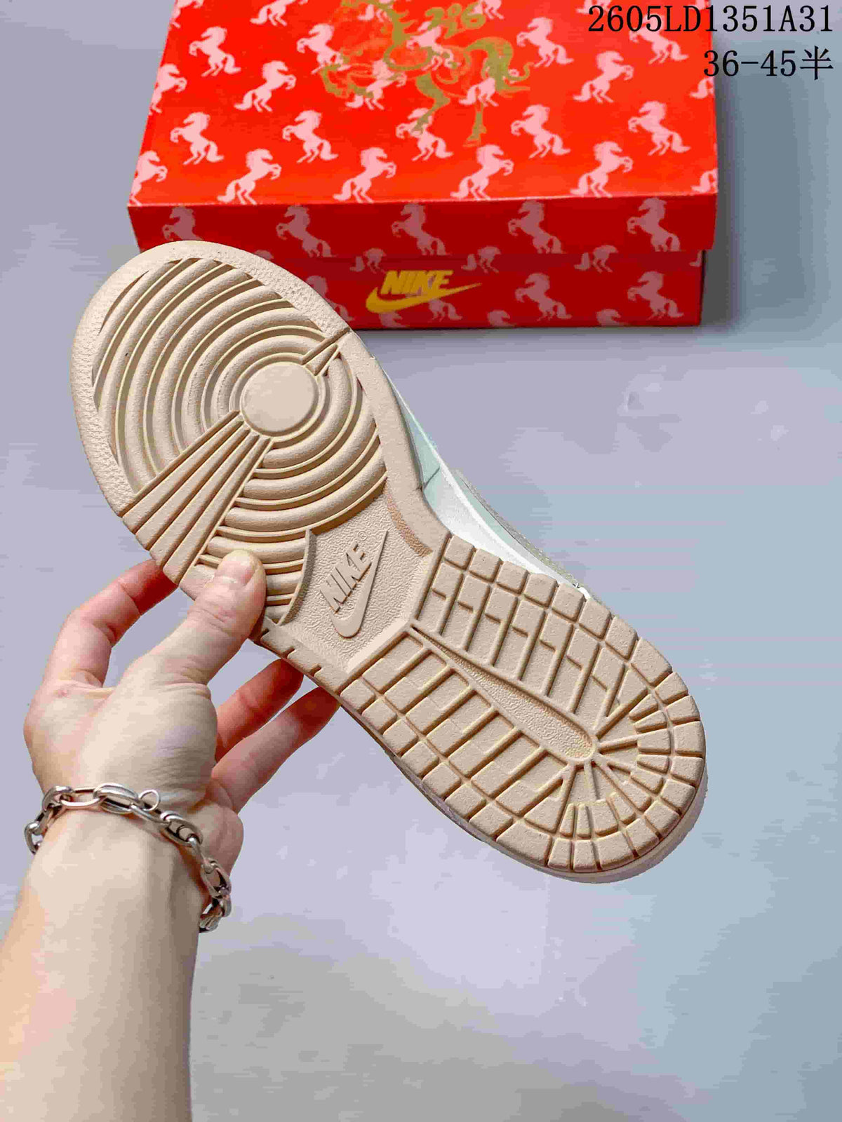 Close-up of the Nike Dunk Low outsole with circular and block-pattern tread