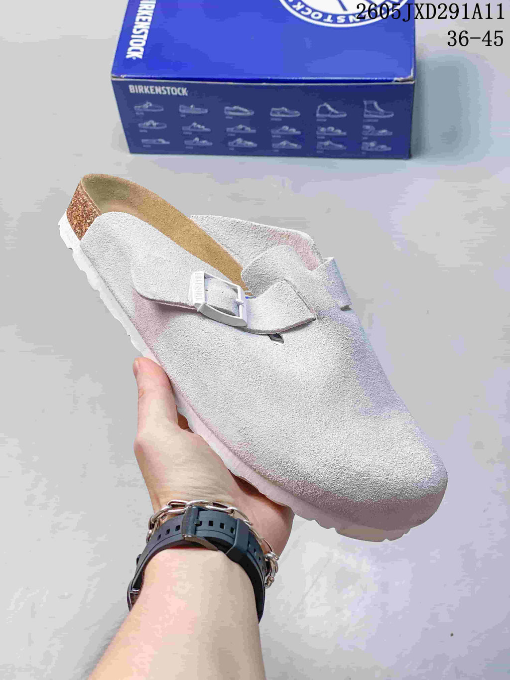 Pale gray suede-like Zurich-style clog sandal with an adjustable buckle strap