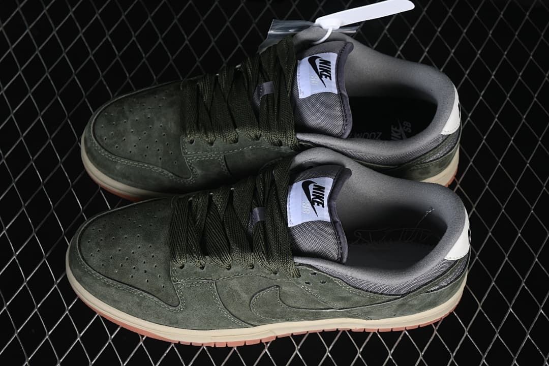 Pair of olive-green Nike SB Dunk Low sneakers viewed from above