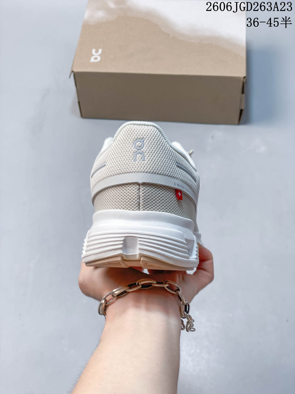 Rear view of an On Cloudtilt Remix sneaker with heel details