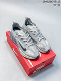 Pair of grey Nike Ava Rover low-top running shoes shown from above on a red shoe box