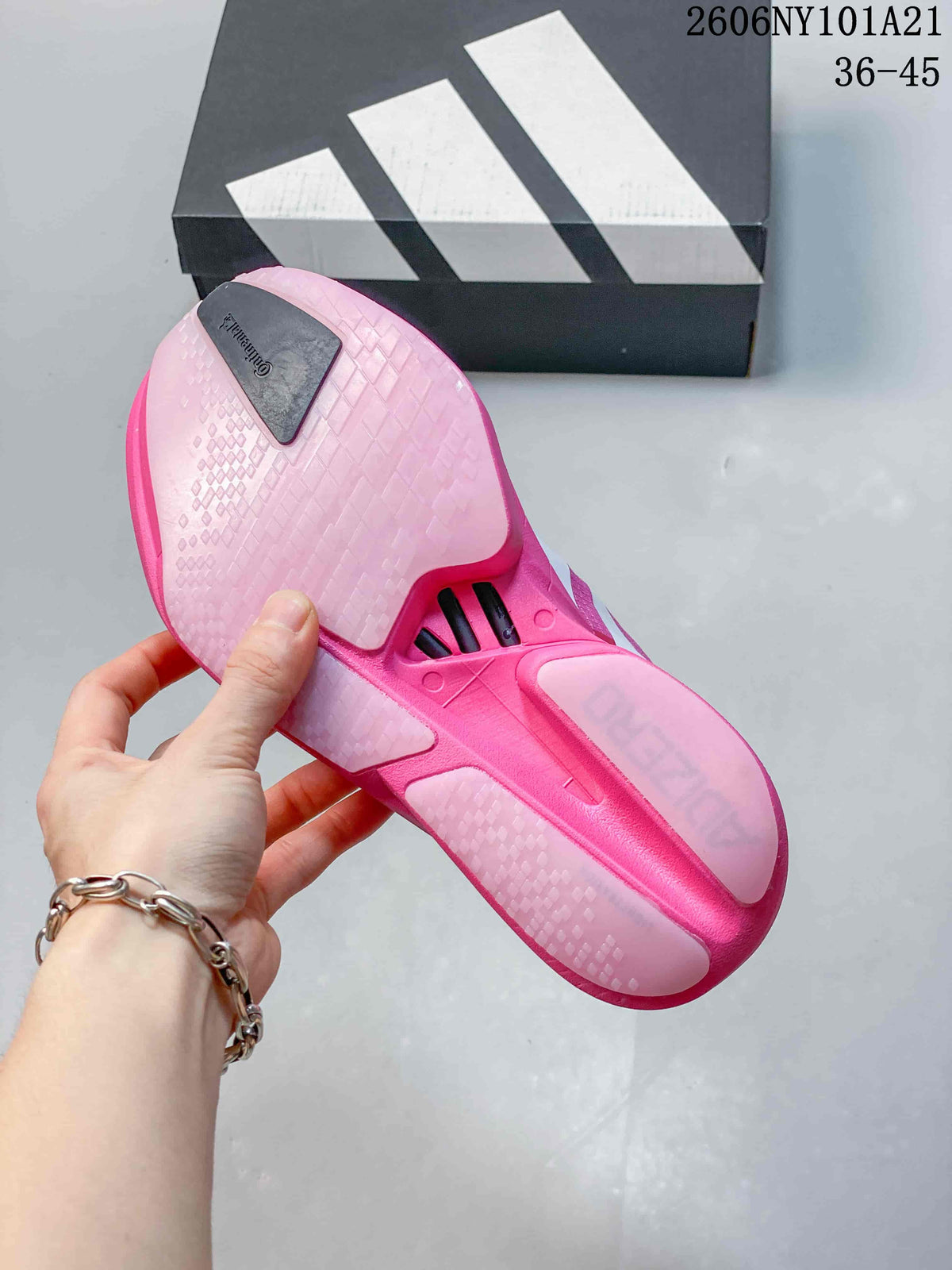 Underside of the pink shoe showing its textured sole