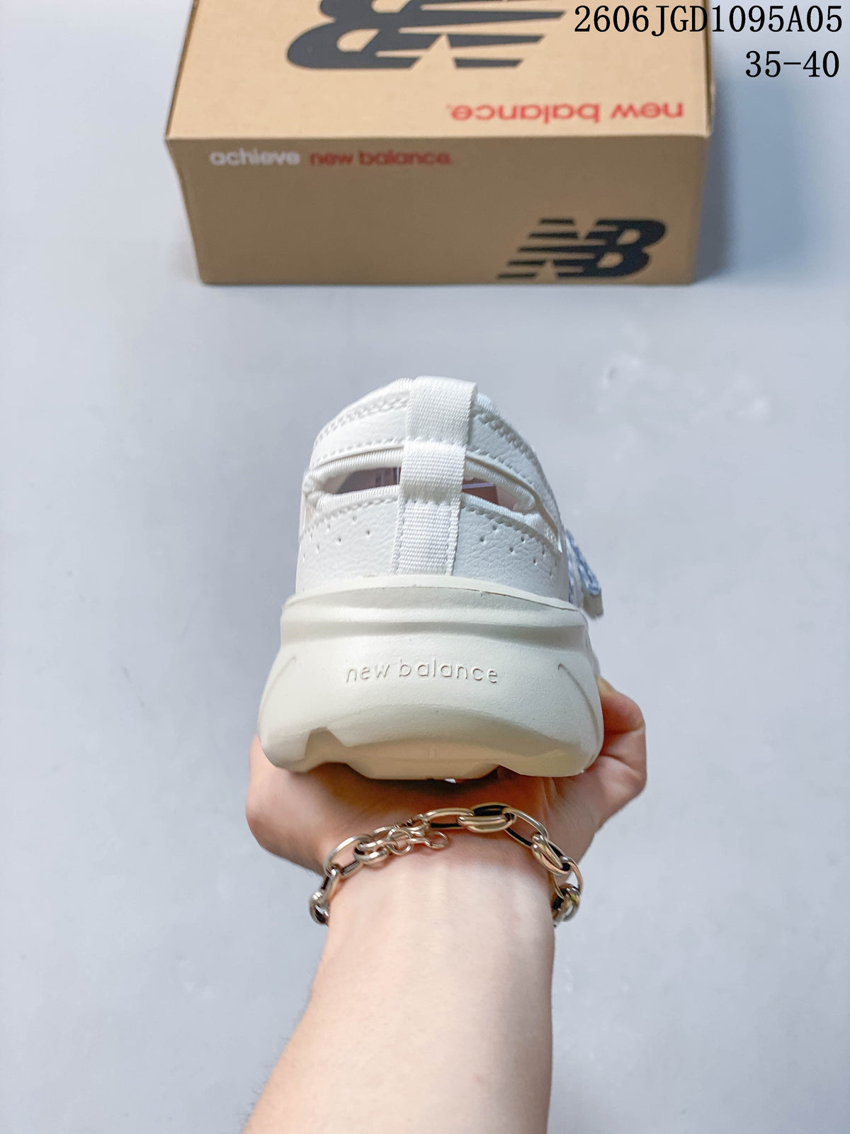 Rear view of a white New Balance Breeze sneaker showing the heel and pull tab