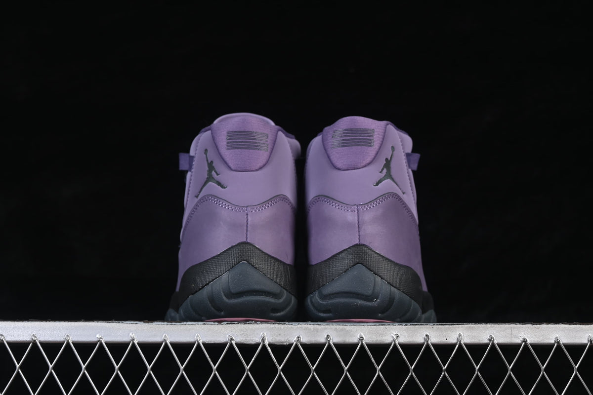 Rear view of the pair showing purple heel panels and dark Jumpman logos.