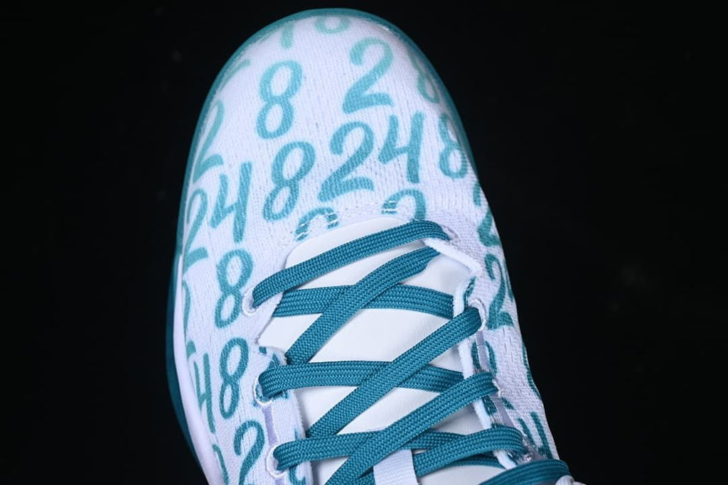 Top view of the number-patterned toe and teal laces