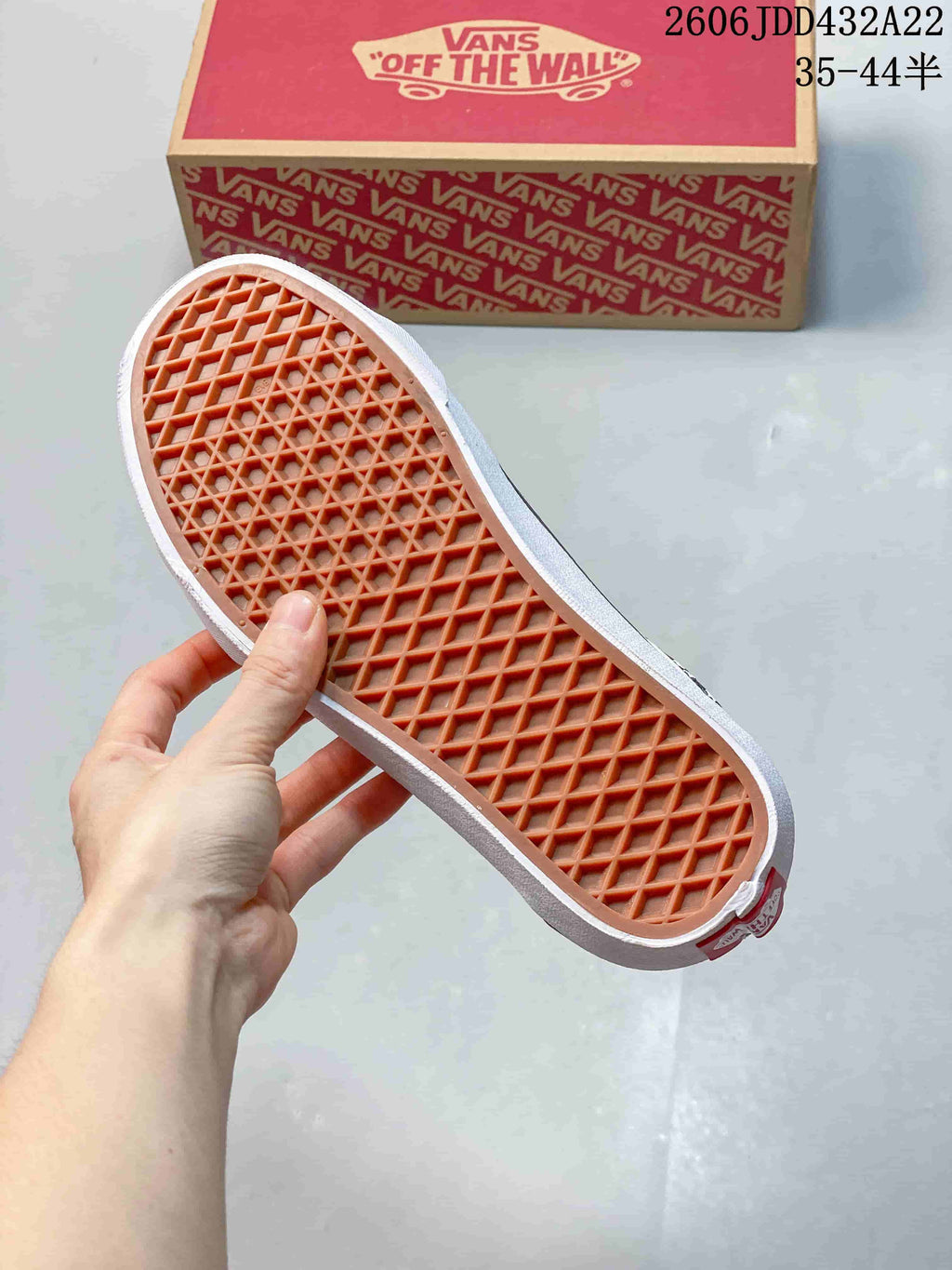 Waffle-patterned outsole on a Vans low-top sneaker