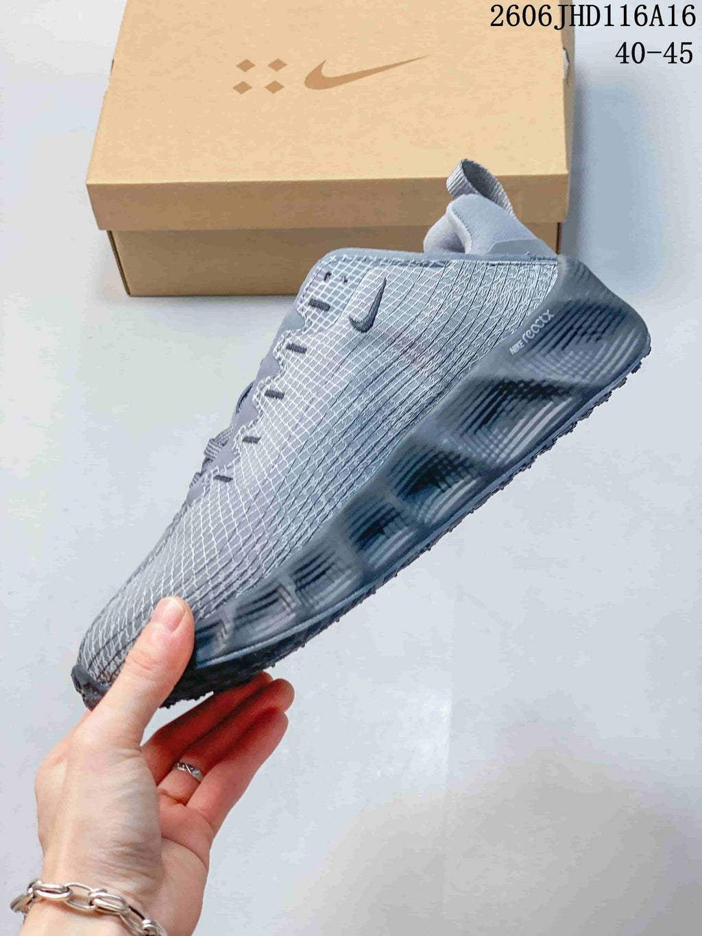 Side view showing the patterned upper and dark sole of a gray Nike Ava Rover Hs shoe