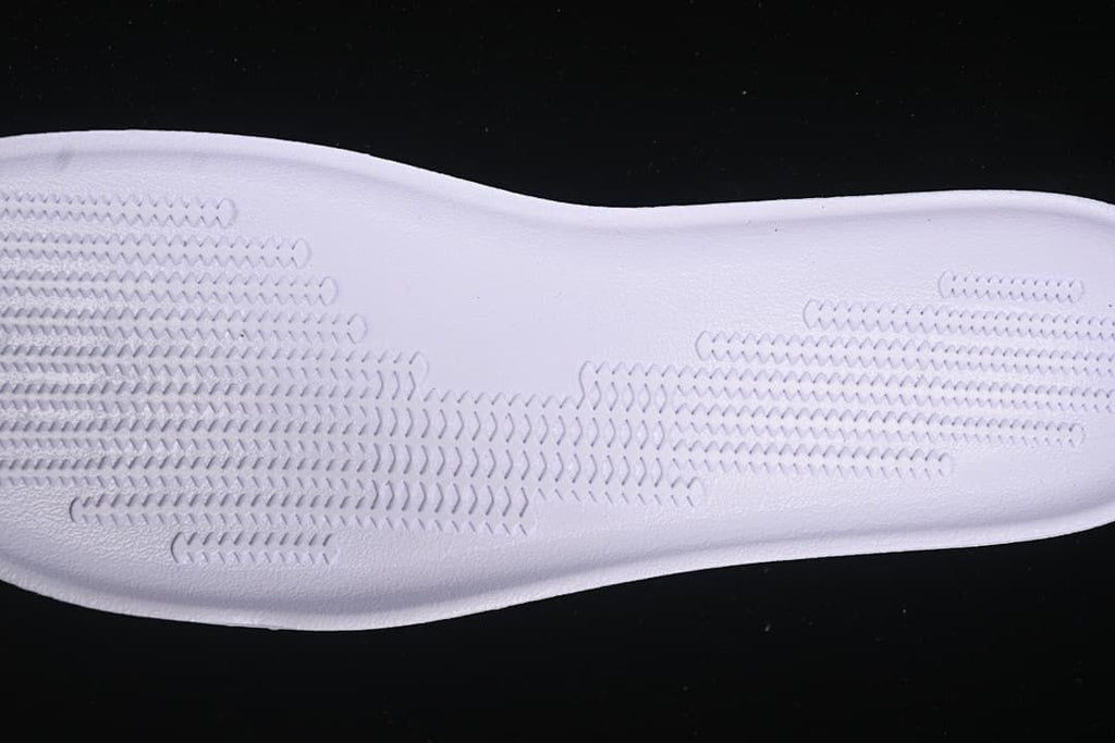 Close-up of the textured tread pattern on a shoe component