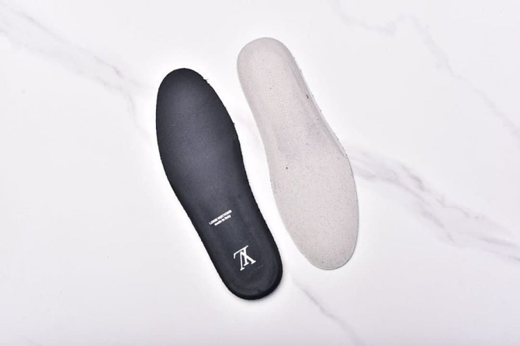 Two removable-looking footbeds shown beside one another