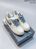 Pair of off-white and gray-blue Nike Air Force 1 '07 LV8 low-top sneakers with red heel details, shown on a Nike shoebox.