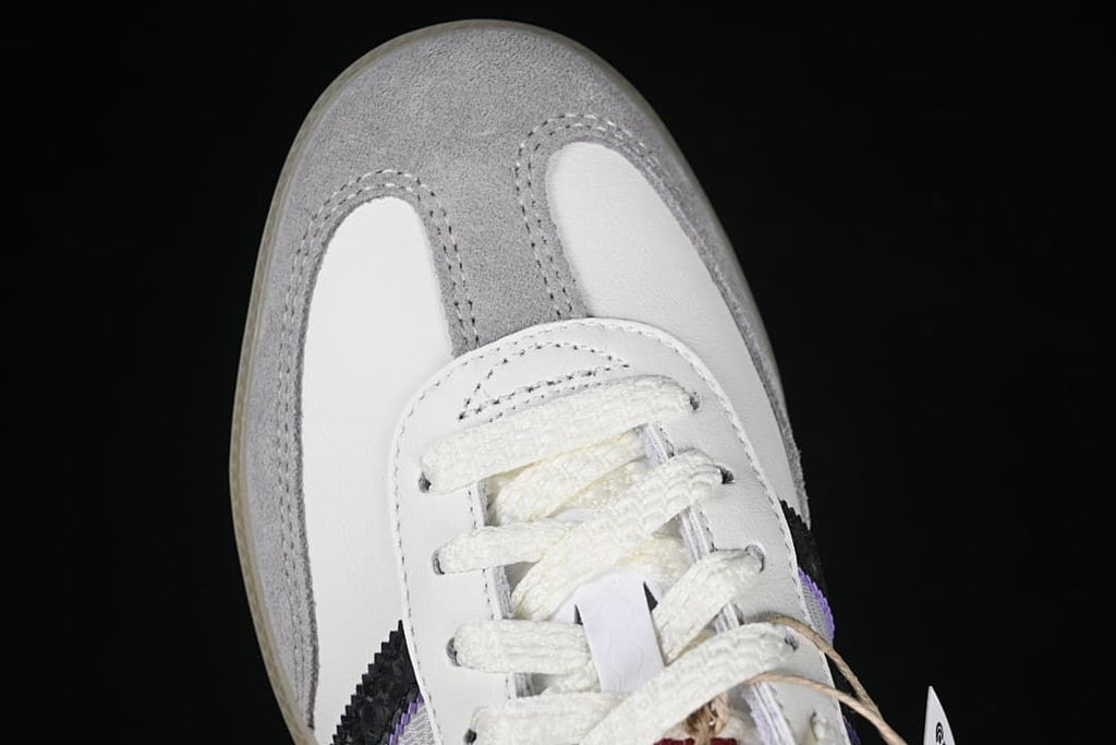 Top view of gray toe overlays and white laces