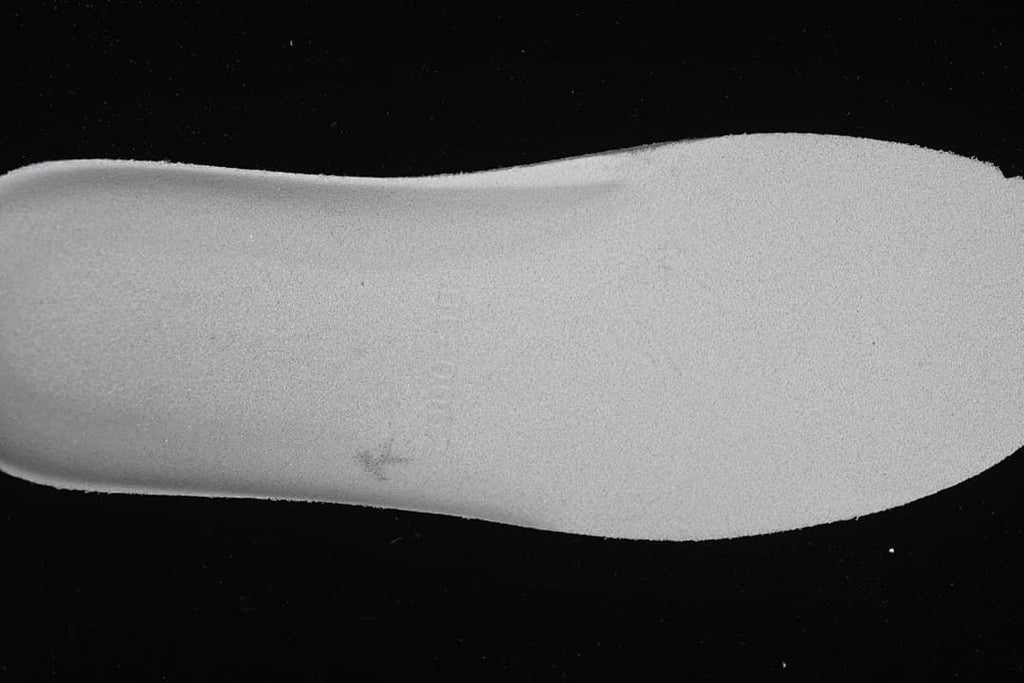 Close-up of the pale gray outsole