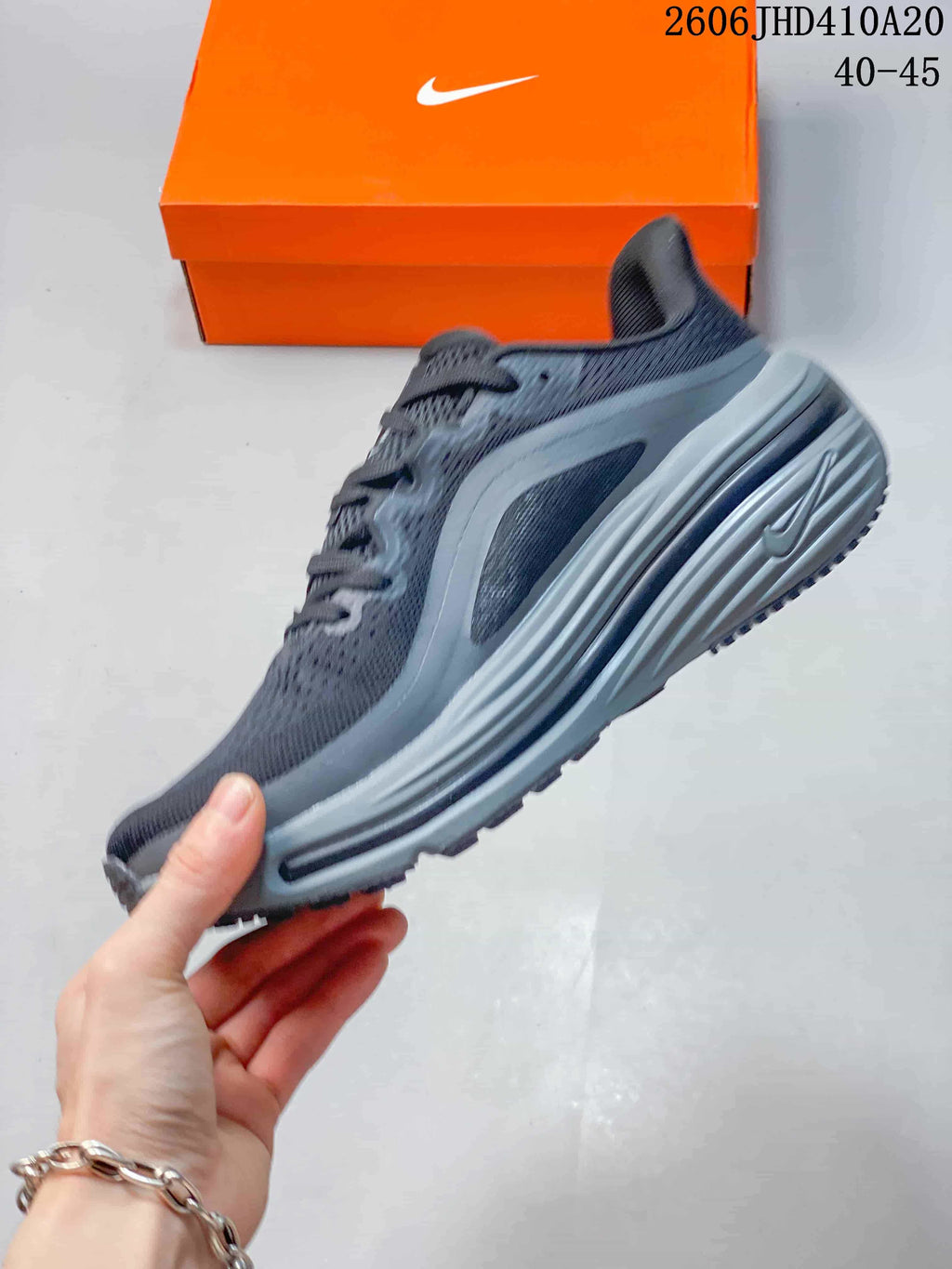 Side profile showing the upper, Swoosh detail, and sculpted sole