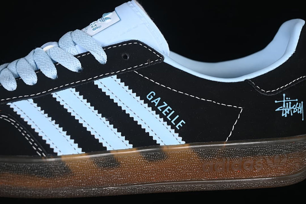 Close-up of the side stripes, Gazelle name and light blue accents