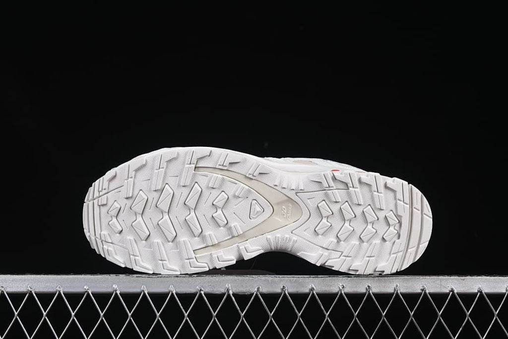 Underside view showing the lugged outsole tread.