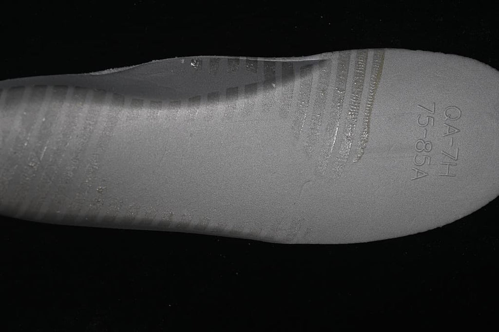 Close-up of the gray outsole heel area