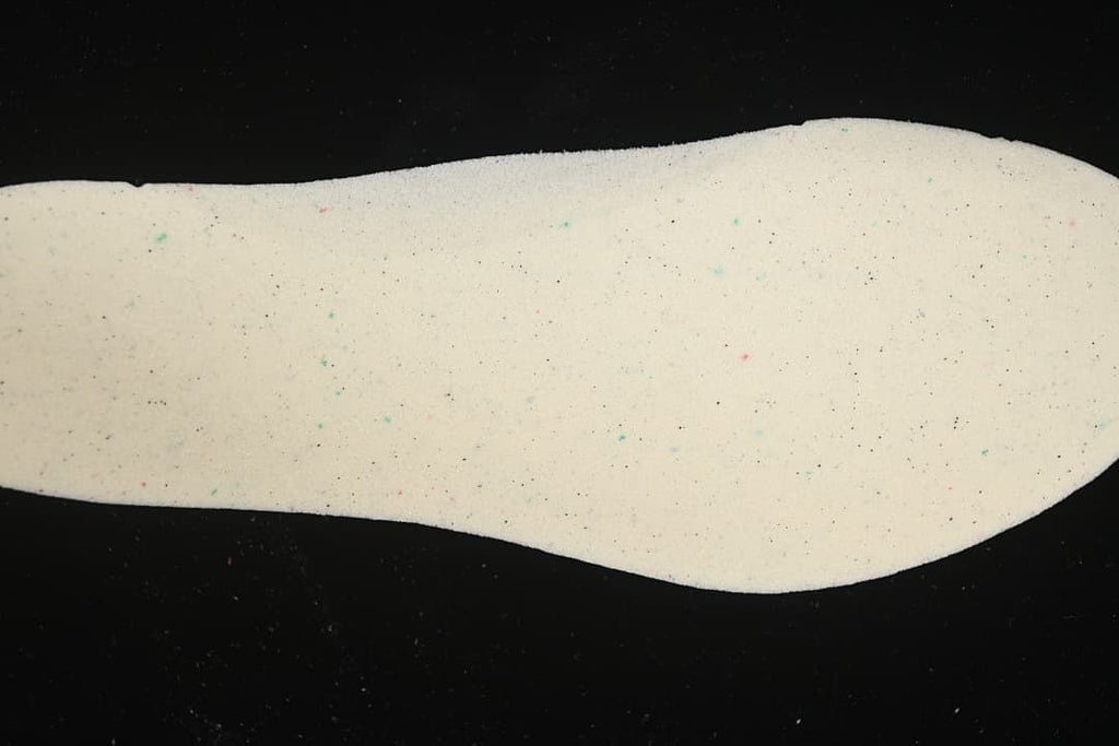 Light-colored shoe insert shown separately