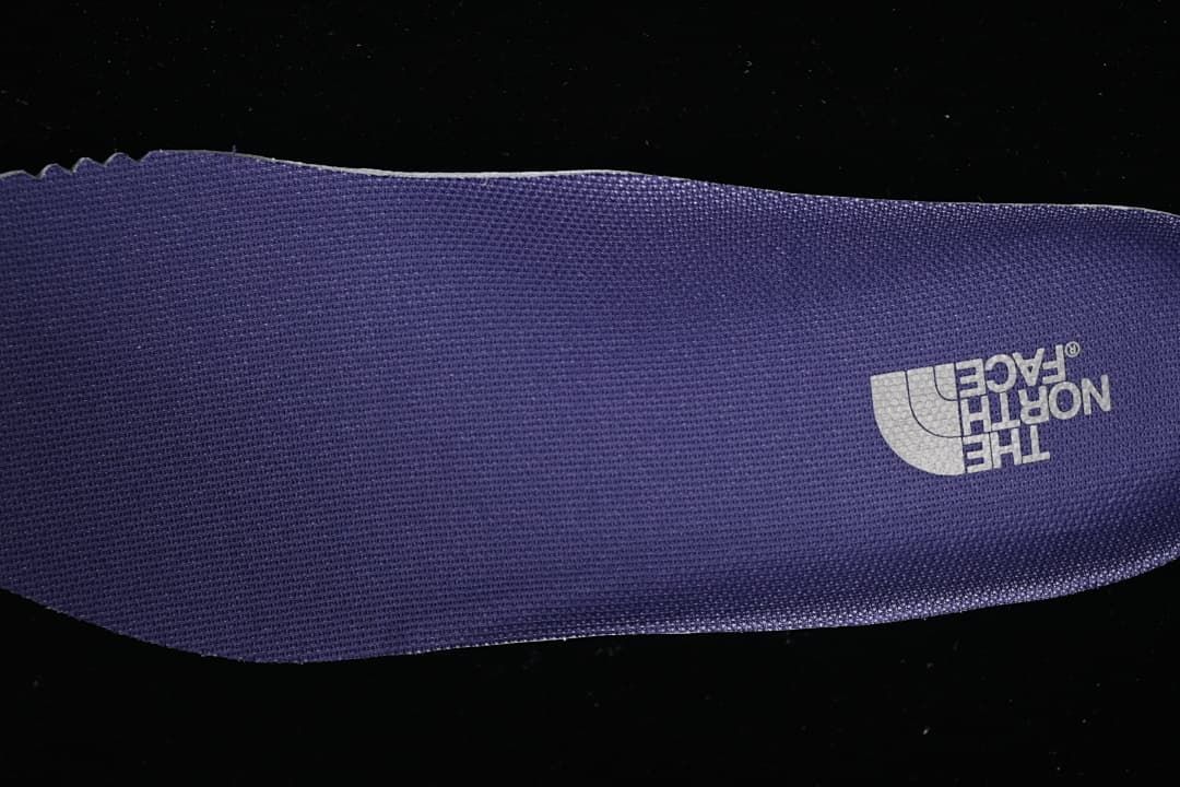 Purple branded insole.
