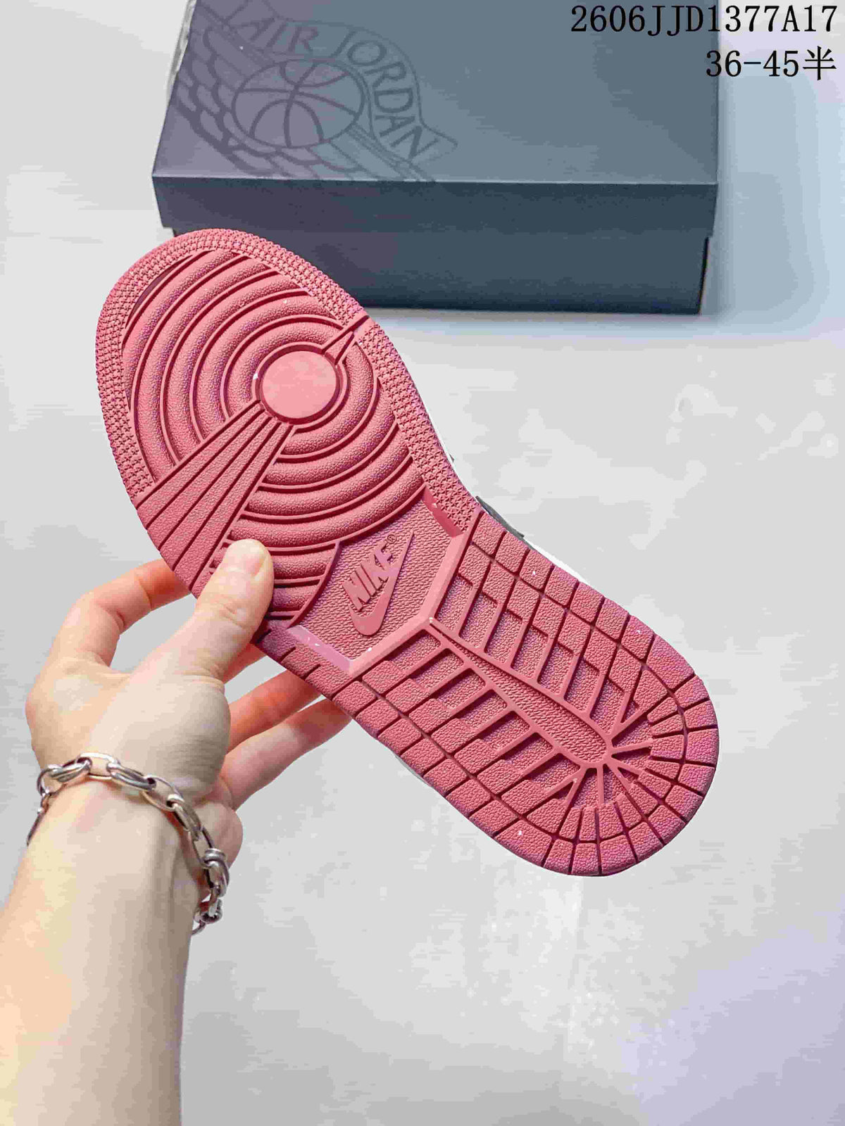 Close-up of the burgundy outsole with circular tread pattern
