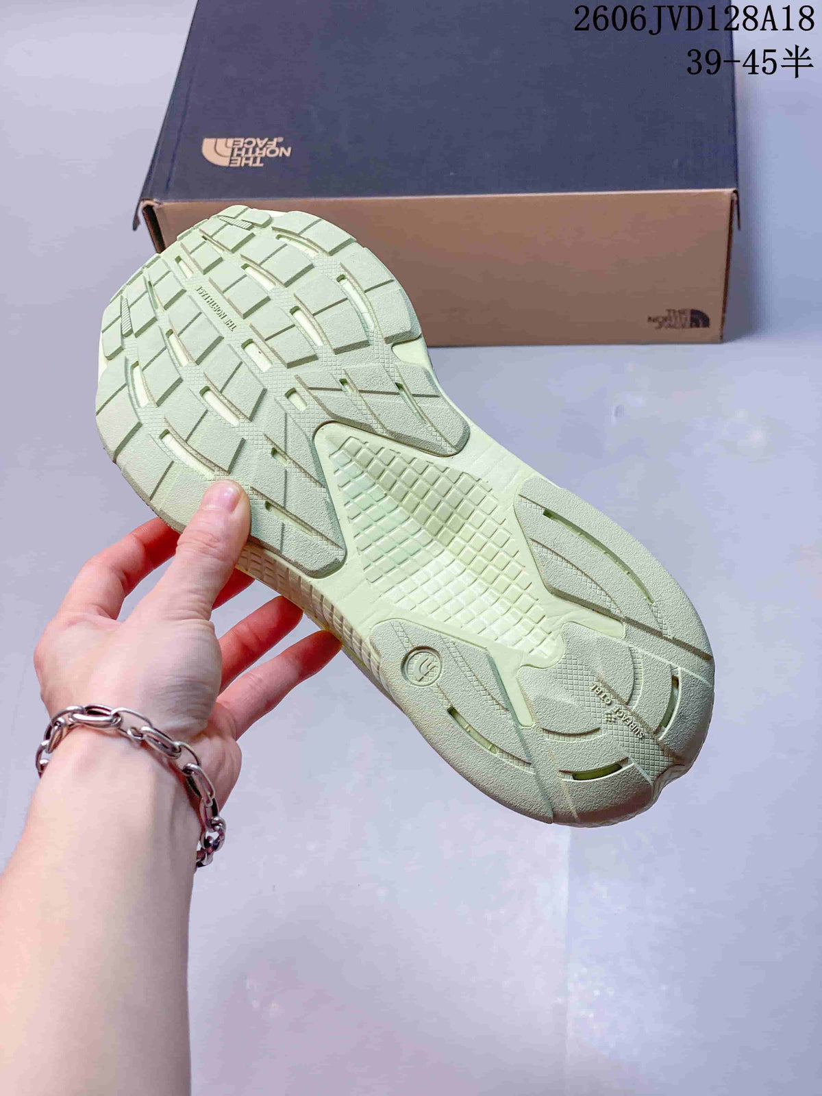 Close-up of the patterned outsole on a The North Face Alta Mesa 500 shoe