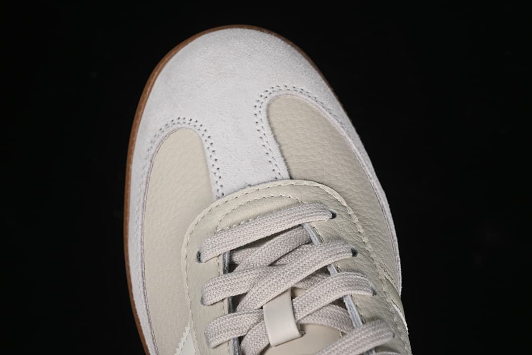 Top-down close-up of the suede-look toe panel and lacing