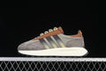 Side profile of the adidas Retropy E5 sneaker in grey, brown, and off-white